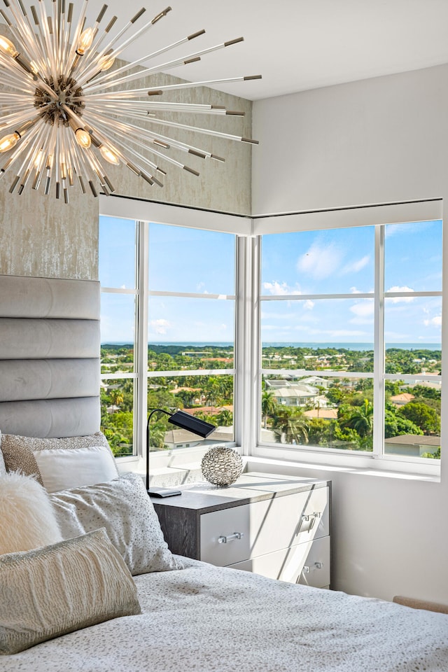 bedroom featuring multiple windows