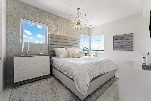 bedroom featuring a chandelier