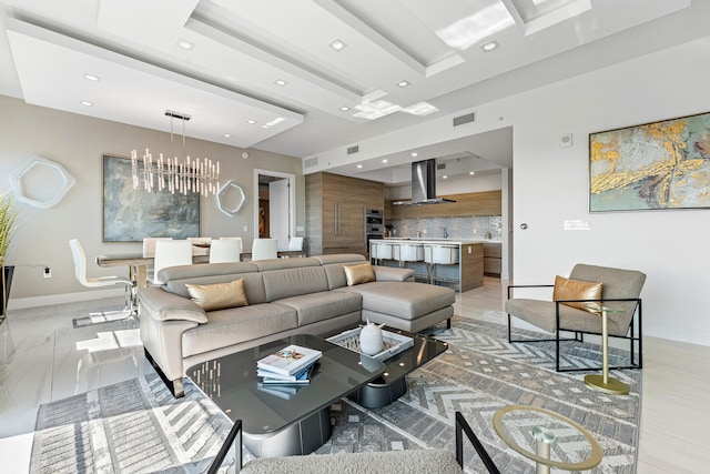 living room featuring a notable chandelier