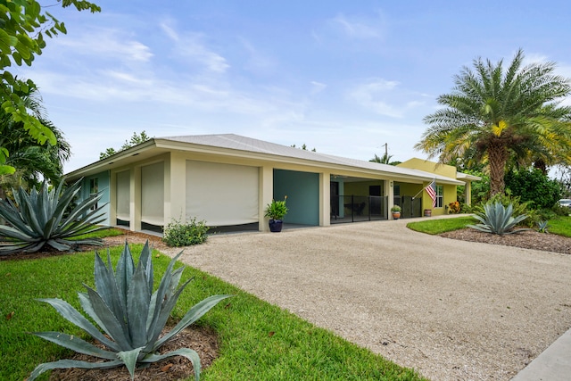 ranch-style home with a front yard