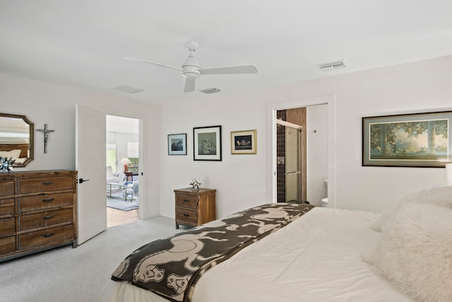 bedroom with ceiling fan and light colored carpet