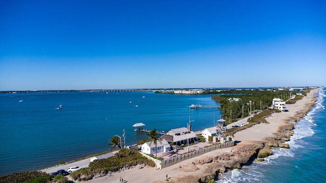 property view of water featuring a beach view