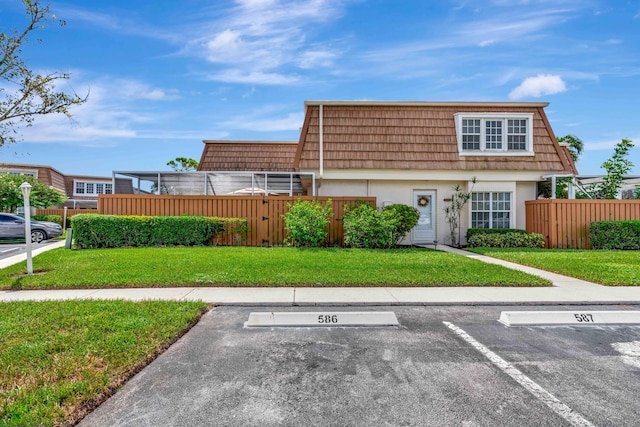 view of front of house with a front yard