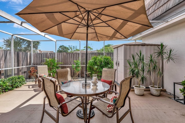 view of patio / terrace with a lanai