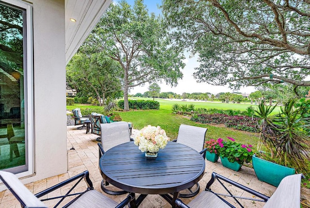 18587 SE Ferland Ct, Jupiter, FL 33469 - view of patio / terrace with outdoor dining area