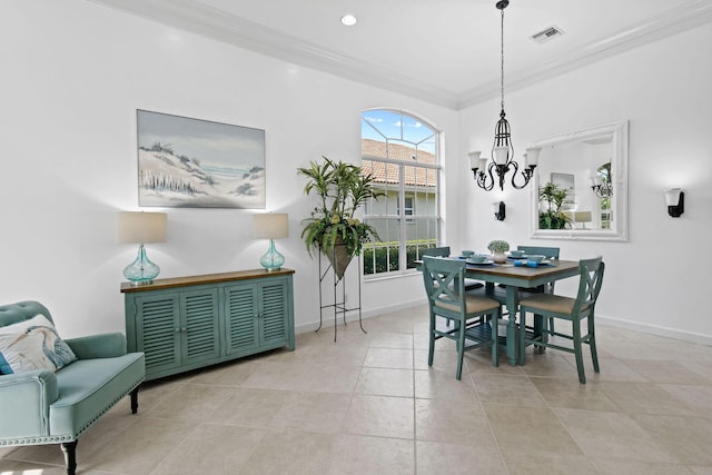 dining area featuring visible vents, crown molding, light tile patterned floors, baseboards, and an inviting chandelier