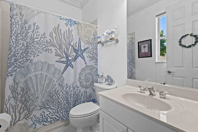 bathroom with ornamental molding, vanity, toilet, and curtained shower