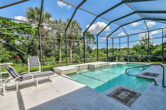 outdoor pool featuring a lanai, a patio, and a hot tub