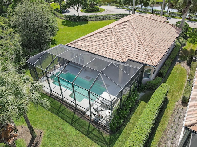 birds eye view of property featuring a water view