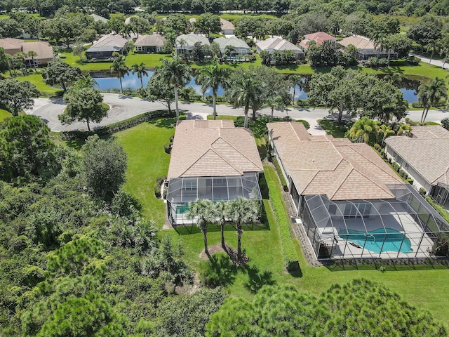 aerial view featuring a water view and a residential view