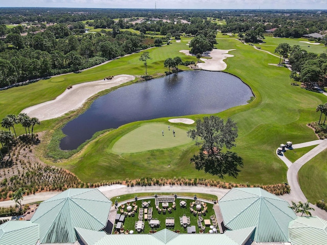 birds eye view of property featuring a water view and golf course view