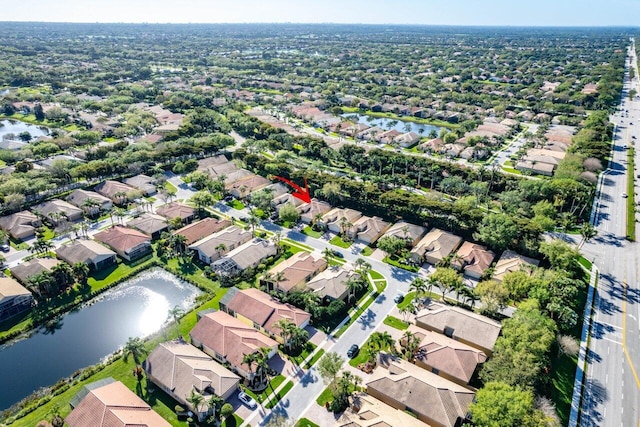 drone / aerial view with a water view