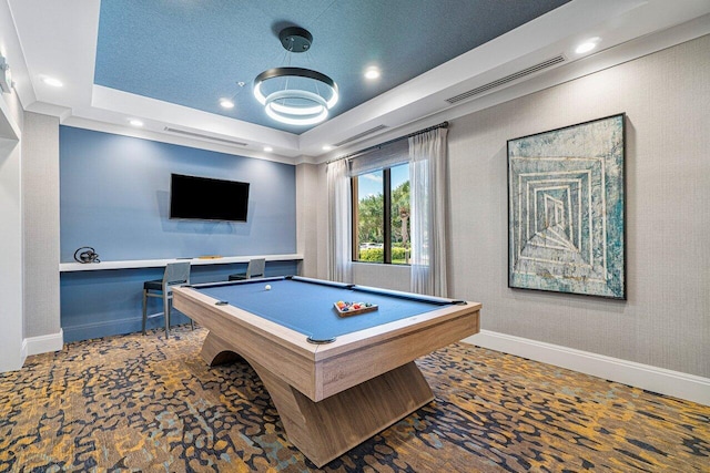 game room with pool table and a tray ceiling