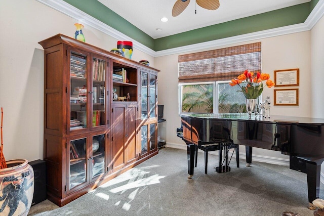 miscellaneous room with carpet, crown molding, and ceiling fan