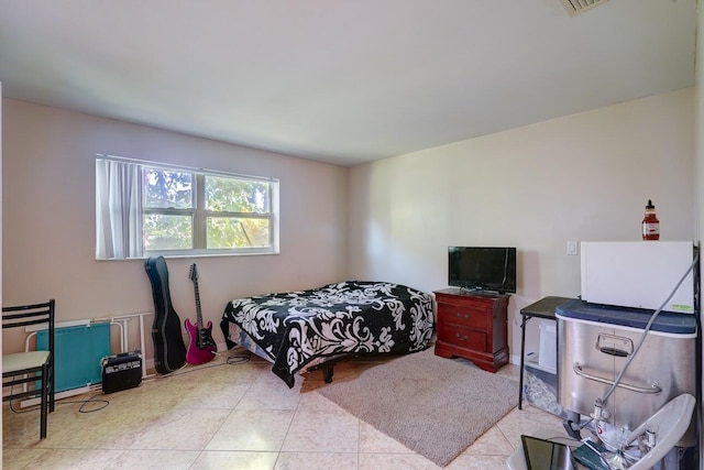 bedroom featuring tile patterned flooring