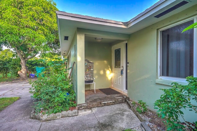 doorway to property featuring a patio