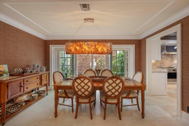 dining space featuring a chandelier and plenty of natural light