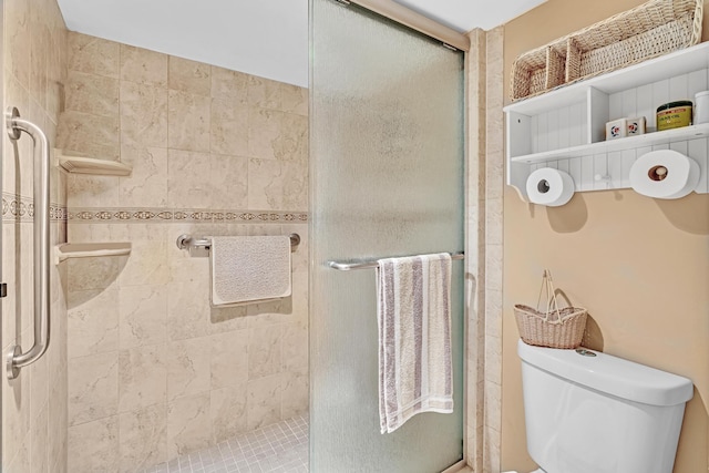 bathroom with walk in shower and toilet