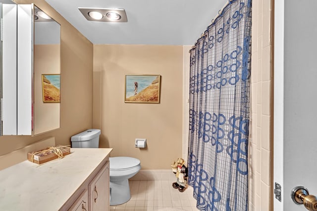 bathroom featuring a shower with shower curtain, tile patterned floors, vanity, and toilet