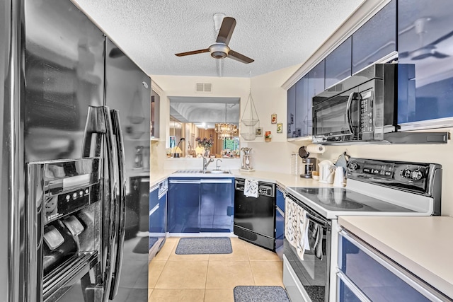 kitchen featuring black appliances, blue cabinets, sink, and ceiling fan