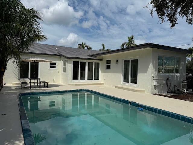 rear view of house featuring a patio area