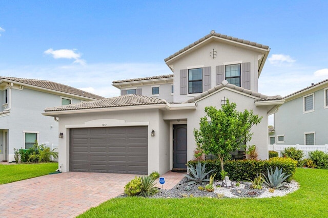 view of front of property featuring a garage