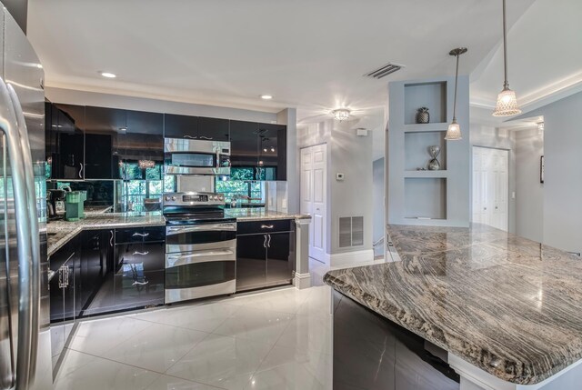 kitchen featuring light stone counters, tasteful backsplash, stainless steel appliances, light tile patterned floors, and decorative light fixtures