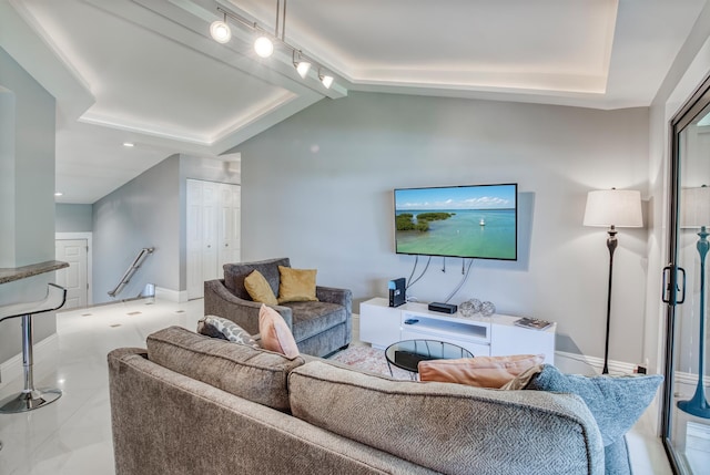 15 Lexington Ln E Unit G, Palm Beach Gardens, FL 33418 - living room with lofted ceiling, rail lighting, and recessed lighting