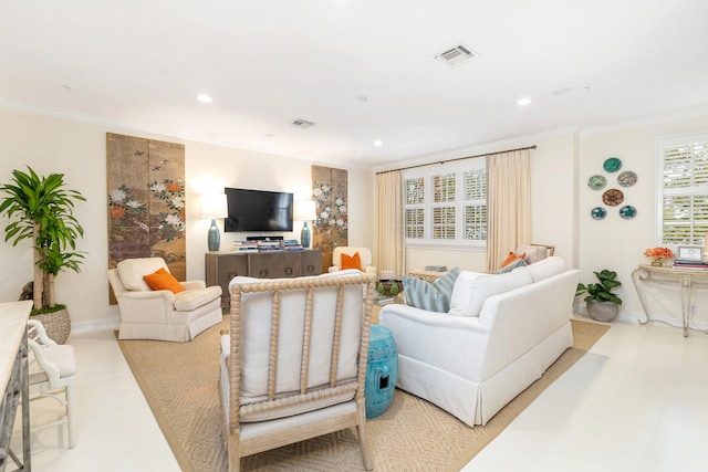 living room with ornamental molding