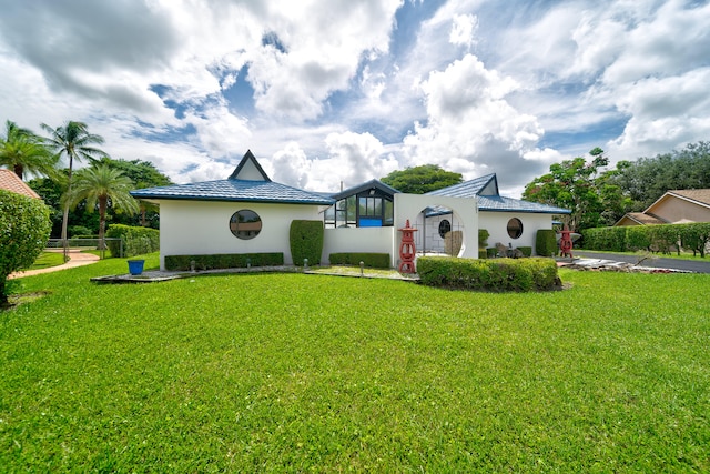 exterior space featuring a front lawn