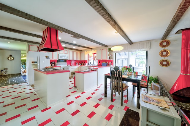 kitchen featuring beam ceiling, kitchen peninsula, white appliances, and white cabinetry