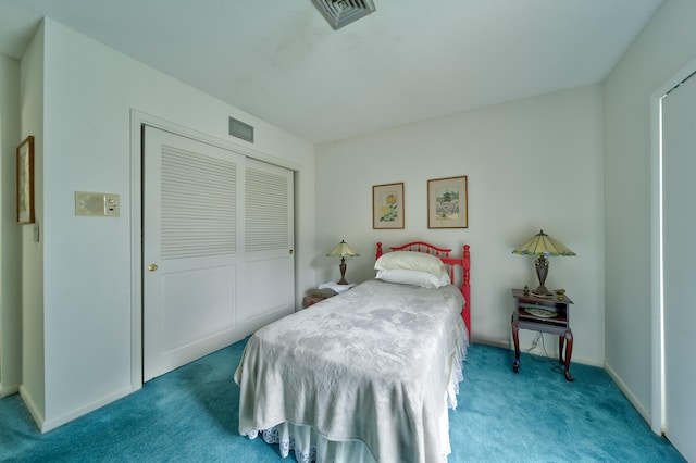 bedroom featuring a closet and carpet floors