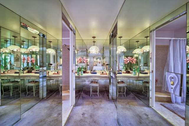 bathroom featuring concrete flooring