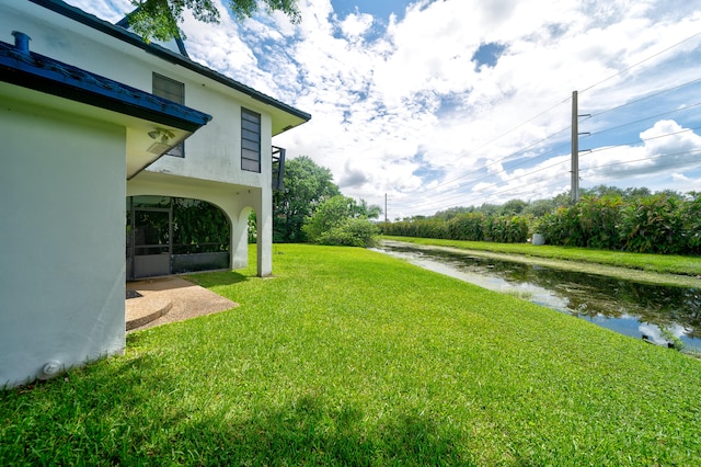 view of yard with a water view