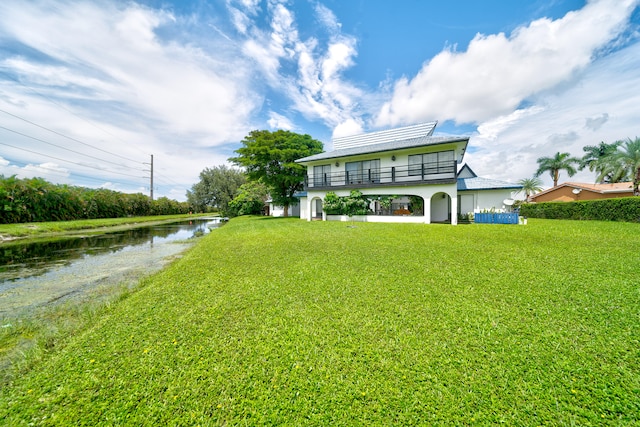 view of yard with a water view