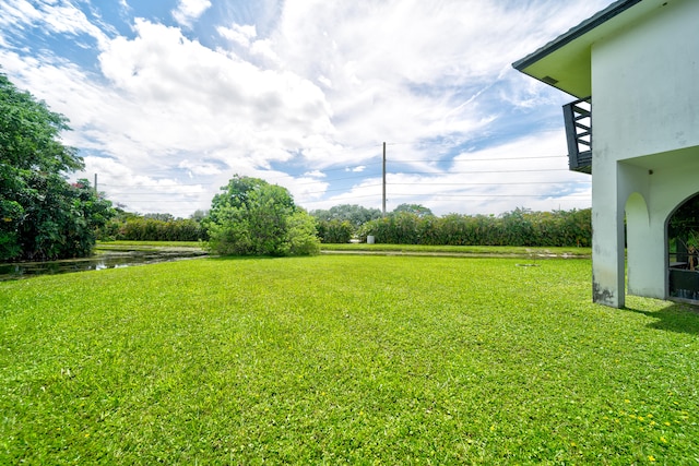 view of yard with a water view