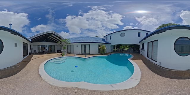 view of pool with a patio area