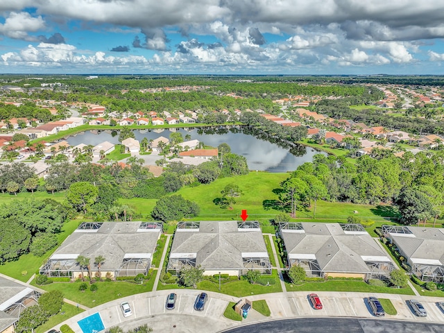 drone / aerial view with a water view