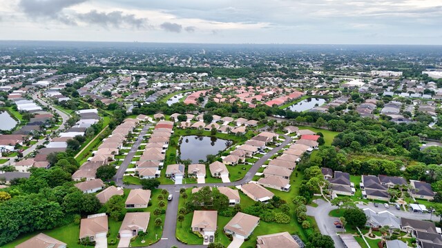 bird's eye view with a water view