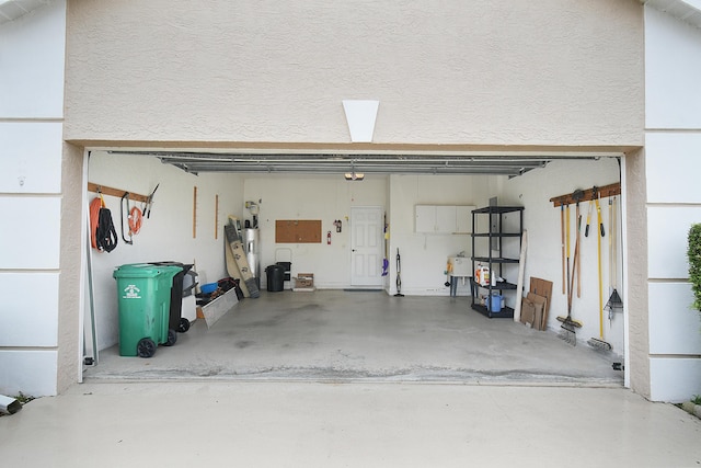 garage featuring a garage door opener