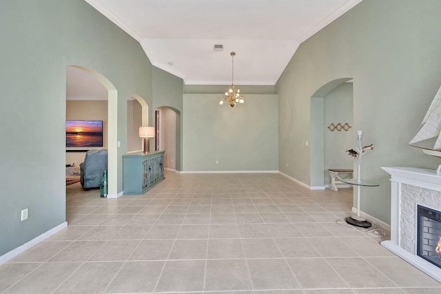 unfurnished living room with light tile patterned floors, crown molding, and a notable chandelier