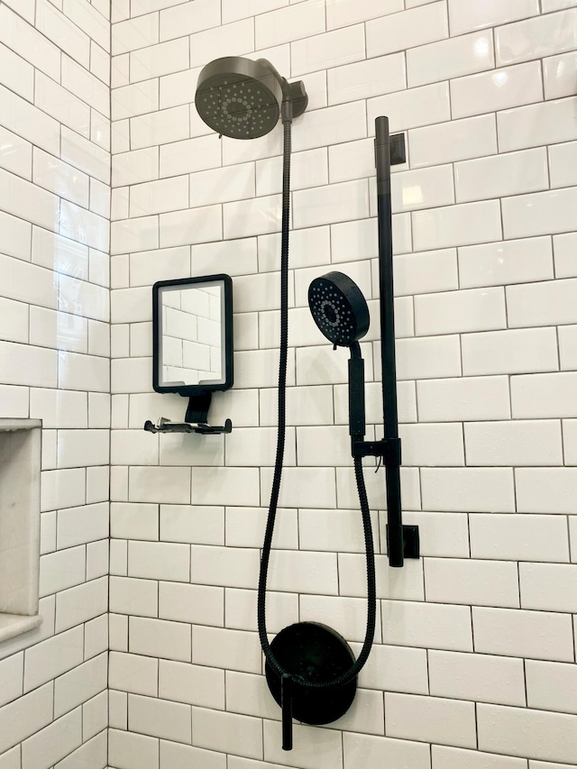 details with a tile shower