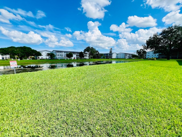 view of yard with a water view