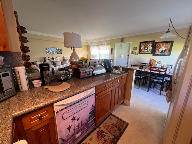 kitchen featuring crown molding, white appliances, light tile patterned floors, and decorative light fixtures