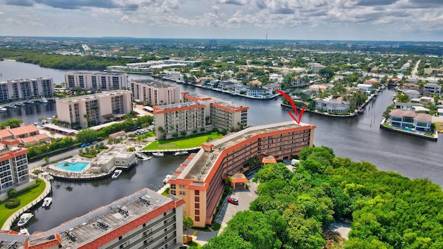 birds eye view of property featuring a water view