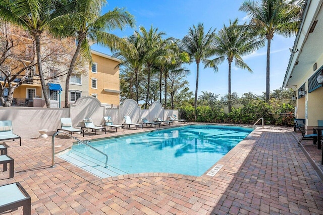 view of swimming pool featuring a patio area