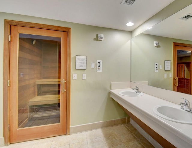 bathroom featuring vanity and tile patterned floors