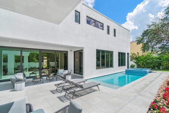 view of pool featuring a patio