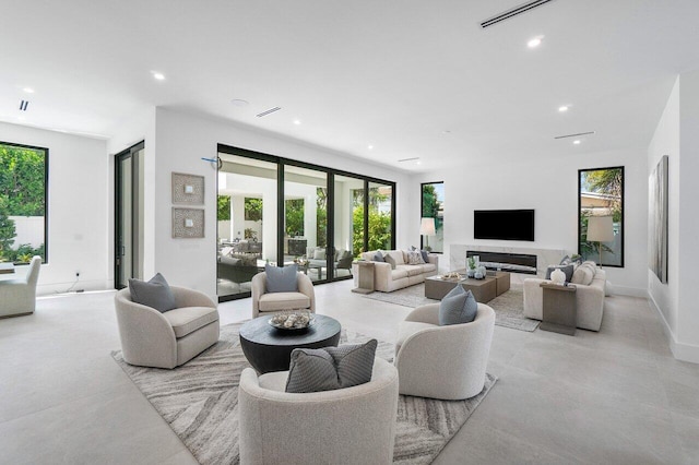 living room featuring plenty of natural light