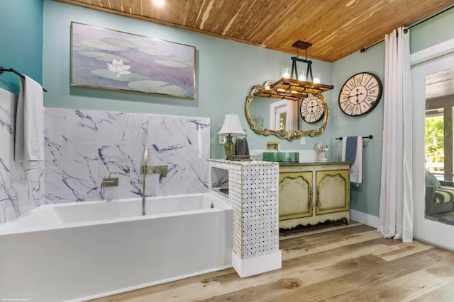 bathroom with vanity, wood ceiling, a bath, and hardwood / wood-style flooring